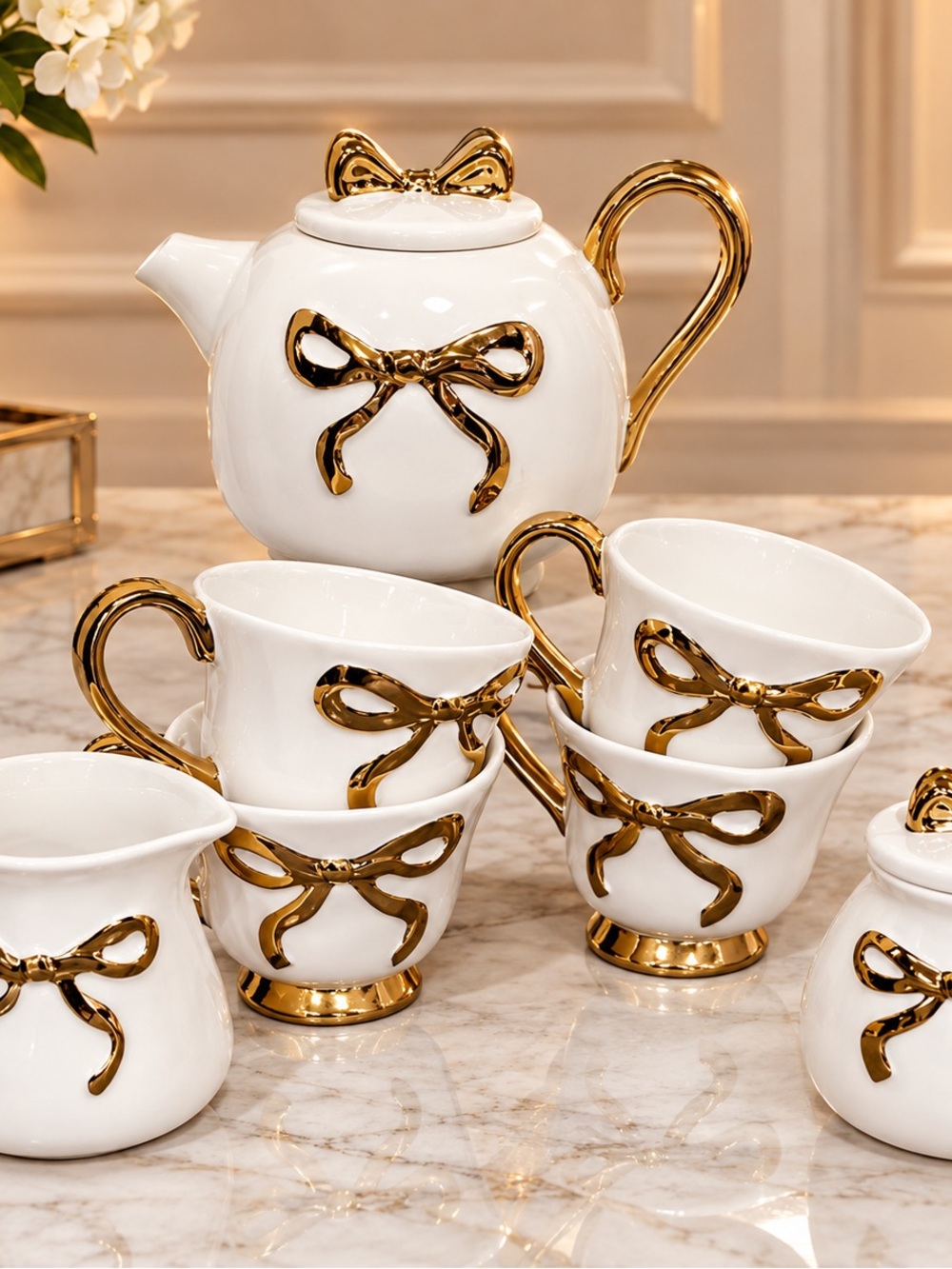 Elegant White and Gold Bow Porcelain Tea Set